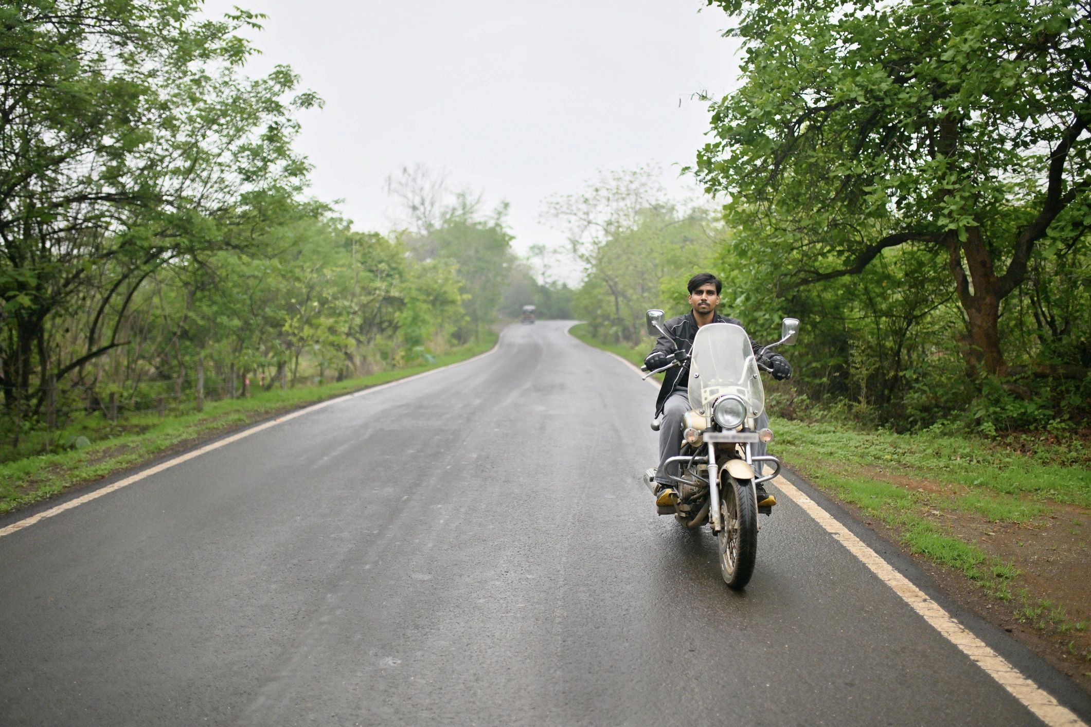 Motorcyclist on a quiet scenic country road