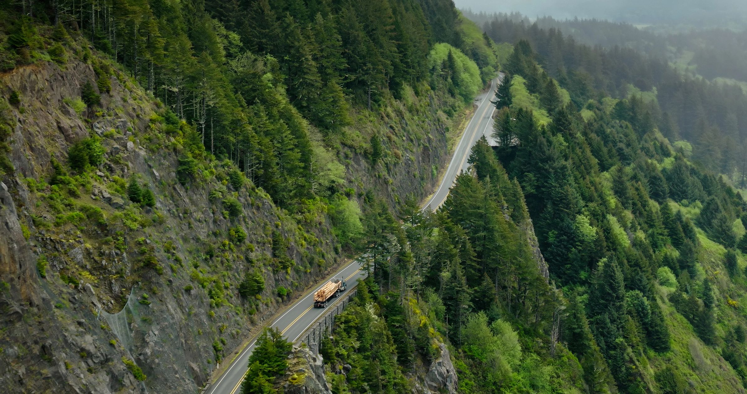 Winding scenic road through a dramatic landscape
